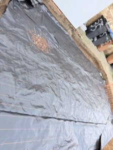 Geotextile membrane and weed control fabric installation during sub-base groundwork preparation for a 65m² driveway on Windbrush Way, Northampton by AAS Group Construction