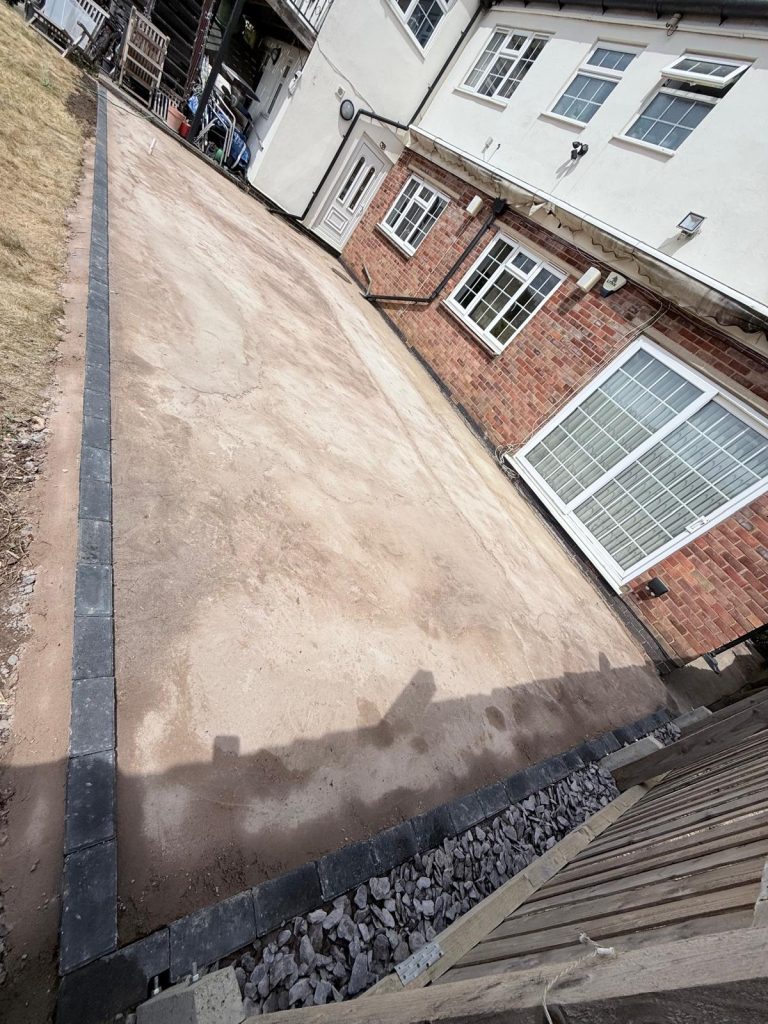 Groundwork preparation and neat block edging for a 40m² resin bound surfacing project in Wellingborough by AAS Group Construction