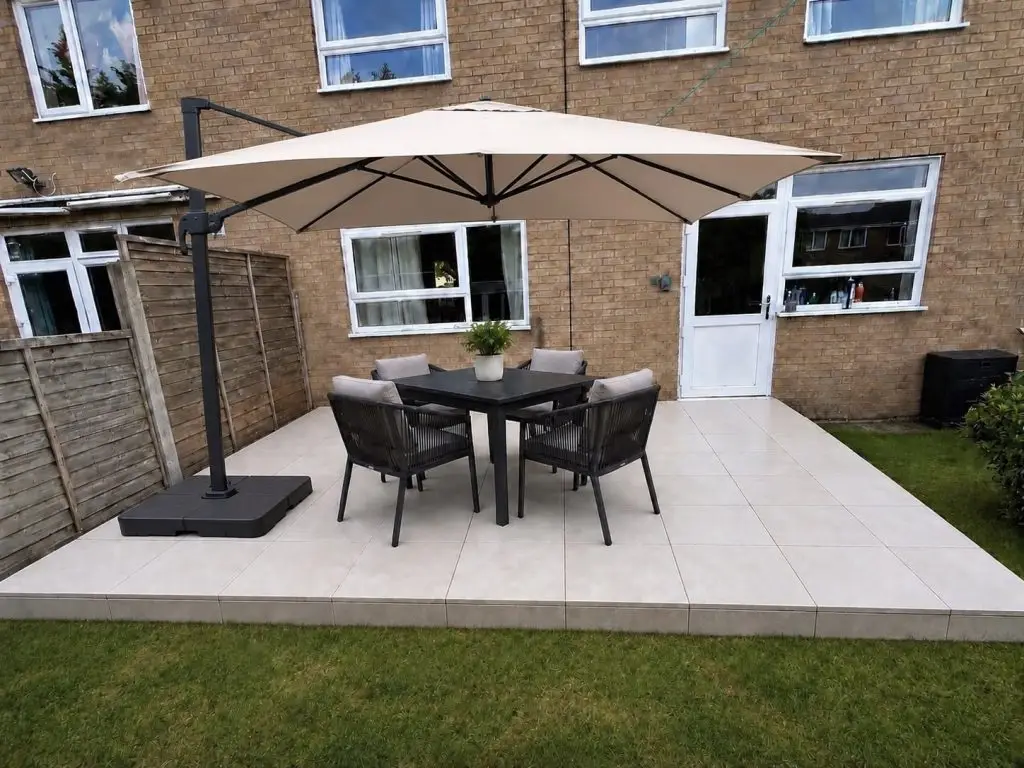 High quality porcelain paving installation with garden furniture setup in Wellingborough