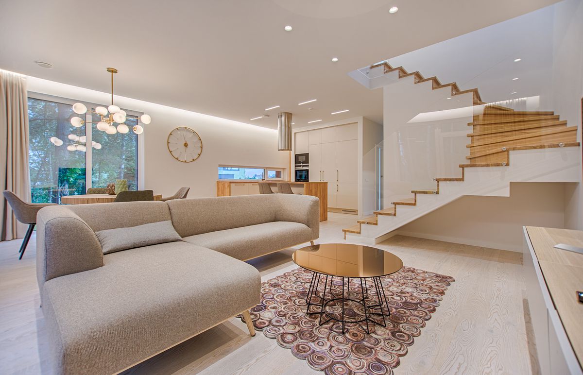Bright open-plan living and kitchen space inside a modern home extension